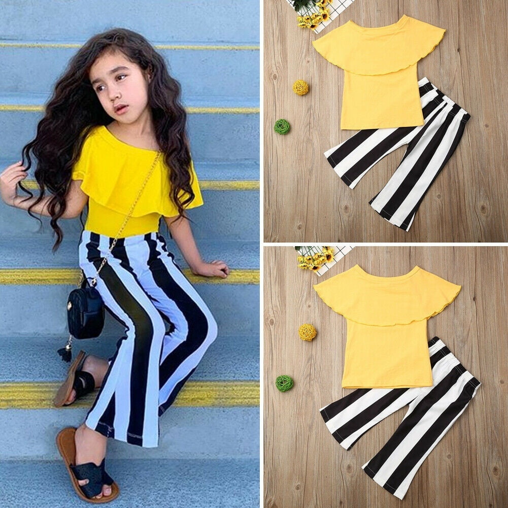 Yellow top with black and white pants Clearance