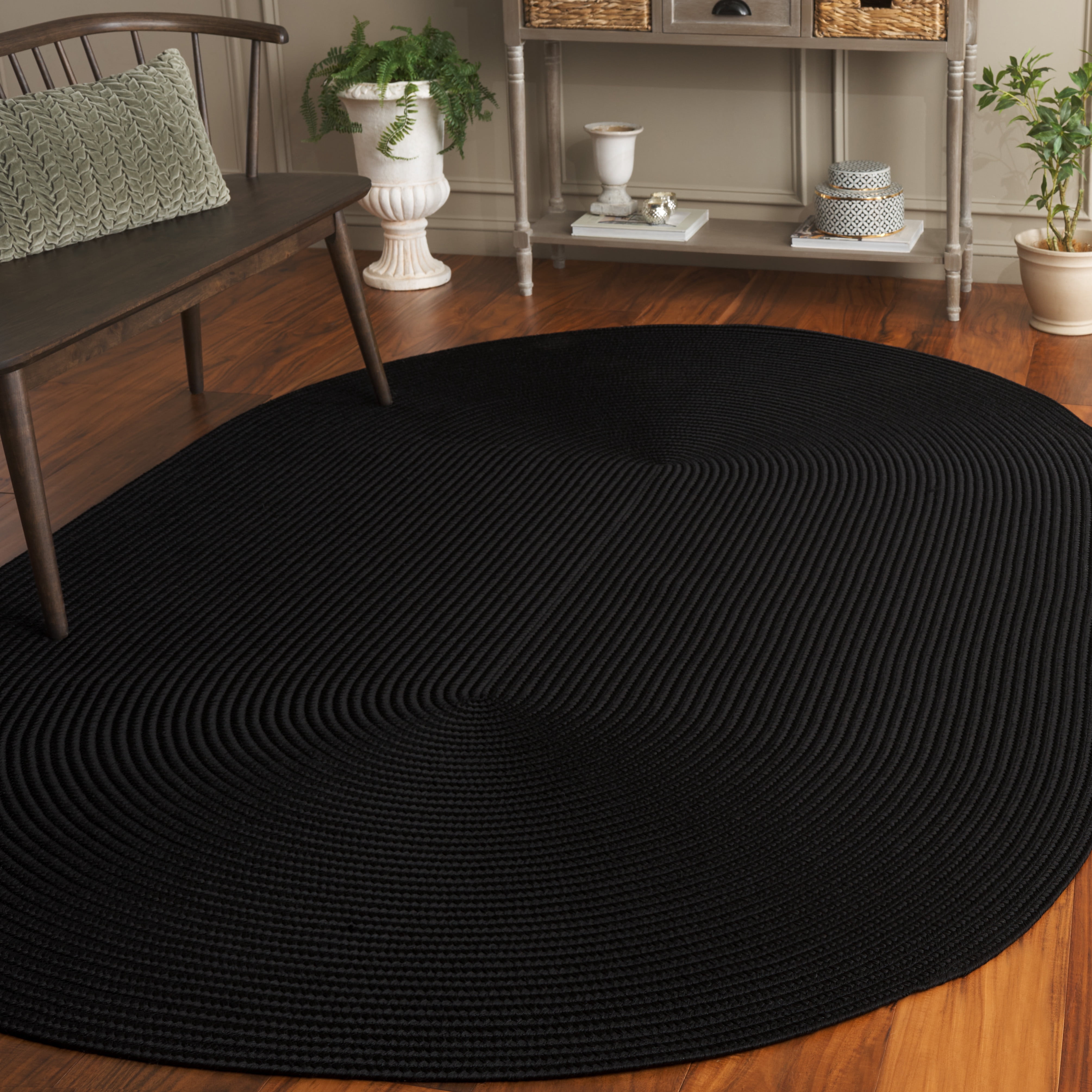 SAFAVIEH Braided Rishika Solid Machine Washable Reversible Area Rug, Black, 5' x 8' Oval