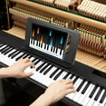 thumbnail image 4 of BX18-61 61-Key Foldable Digital Piano with LCD Screen, Bluetooth Connectivity, 1000mAh Rechargeable Battery - 128 Tones, 128 Rhythms, 15 Demo Songs & 8 Percussion Sounds, Includes Music Stand, Pedal,, 4 of 6
