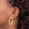 thumbnail image 3 of Primal Gold 14 Karat Yellow Gold Textured Tube Hoop Earrings, 3 of 4
