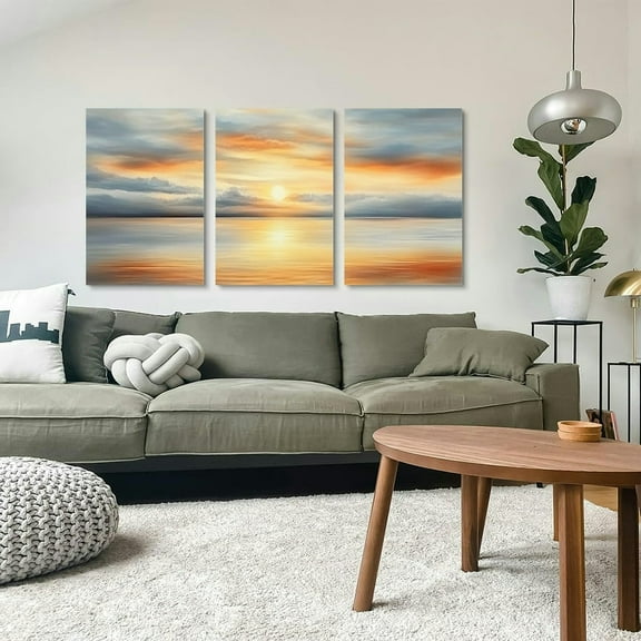 Bring the stunning seaside sunrise into your home with this dynamic ocean dawn canvas art.  Perfect for living rooms, bedrooms, or beach-themed spaces, 12x18 in  3 Piece