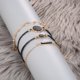 thumbnail image 5 of Conjunto de pulseras boho para mujer, 5 piezas, elegantes pulseras con cuentas negras y forma geométrica, brazaletes y pulseras, conjunto de joyas para mujer y niña, 5 of 6