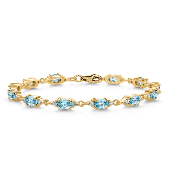 Gem Stone King 18K Yellow Gold Plated Silver Blue Zircon and White Moissanite Tennis Bracelet for Women (8.71 Cttw, Gemstone Birthstone, Oval 6X4MM, 7.5 inch)