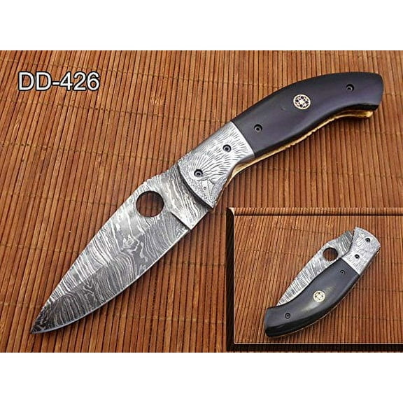 Damascus steel finger hole blade 8" Long folding knife. Natural Bull Horn scale with Bird engraved steel Bolster. Strong brass Liner Lock equipped, Cow Leather sheath included