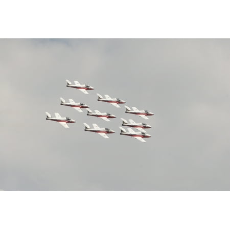 The Snowbirds 431 Air Demonstration Squadron of the Royal Canadian Air Force perform aerobatics during the Wings Over Houston 2007 airshow Poster