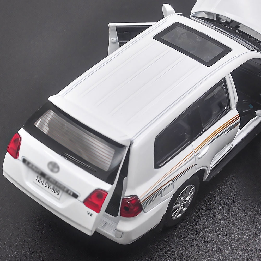 1:32 scale Toyota Land Cruiser Prado die-cast car model with opening doors, lights, sound and spring return function. Birthday gift toy car for boys.