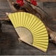 thumbnail image 2 of Abanico Mano Plegable Bolsillo Papel Bambú DIY para Fiesta Bodas() Amarillo, 2 of 5