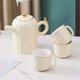 thumbnail image 4 of Juego de ocho piezas de tazas de cerámica for sala de estar, tetera de lujo ligera for el hogar, juego de té, taza de té, regalo exquisito for cualquier ocasión, 4 of 5