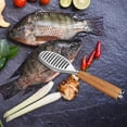 thumbnail image 1 of Removedor de de pescado de acero inoxidable Limpieza rápida Pescado de pescado Peeling Cepillo Mango de madera Escala Soledad Removedor de escamas, 1 of 10