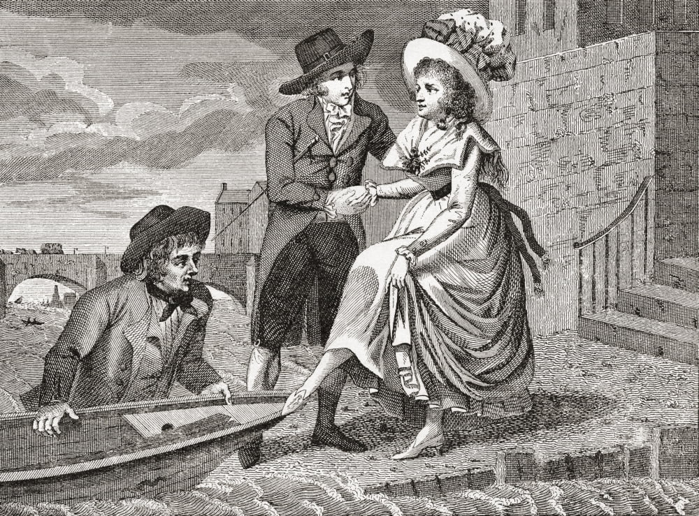 A young man helps a pretty young woman into a wherry which will cross the Thames river in London The young boatman who is standing in the water holds the boat against the landing-place The woman raise