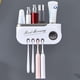 thumbnail image 1 of Portacepillos de dientes de pared con dispensador automático de pasta dental | Organizador de baño de 4 tazas | Plástico ABS negro | Soporte adhesivo para superficies de azulejos, madera y vidrio, 1 of 7