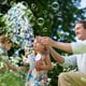 thumbnail image 5 of Máquina de burbujas con depósito de 240ML - Soplador automático para juegos al aire libre y fiestas de cumpleaños - Máquina portátil de burbujas con funciones interactivas padre-hijo, 5 of 9
