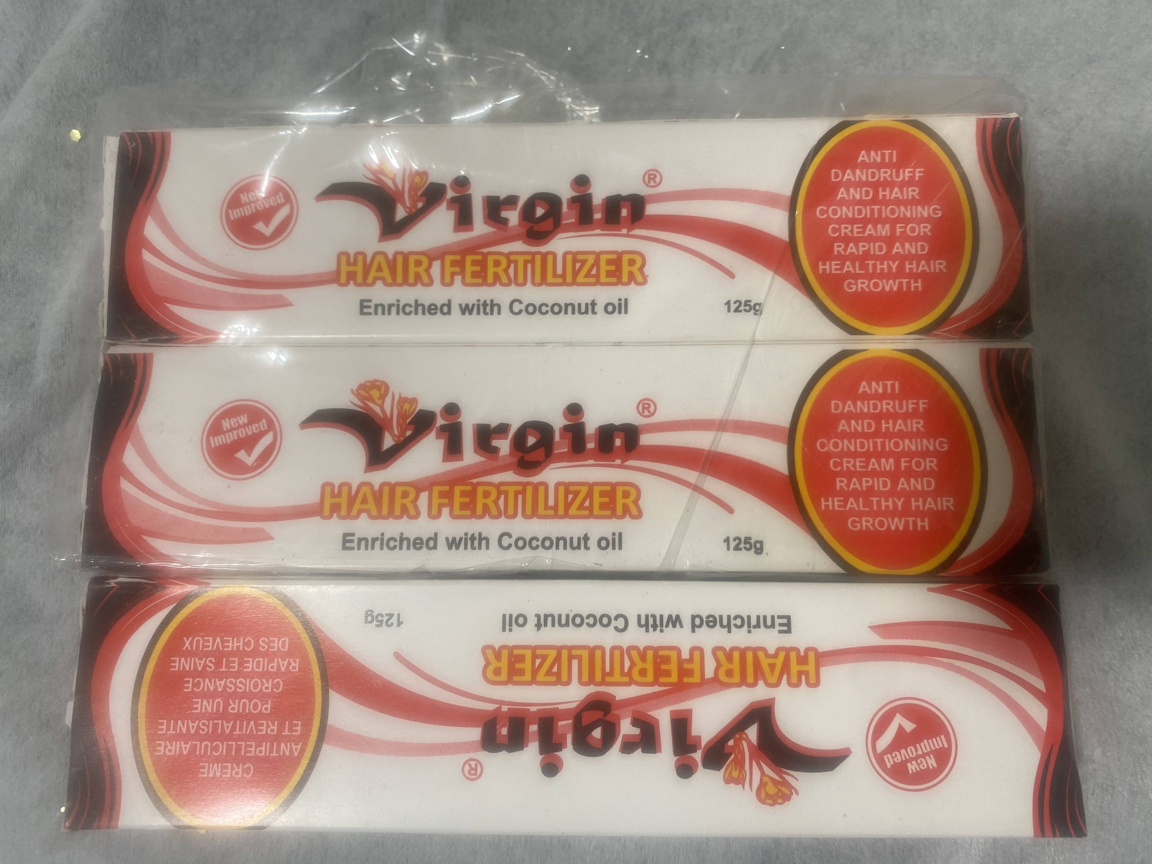 Virgin Hair Fertilizer Now wears a new Name -New and Improved 125g ( 4 pack!!)