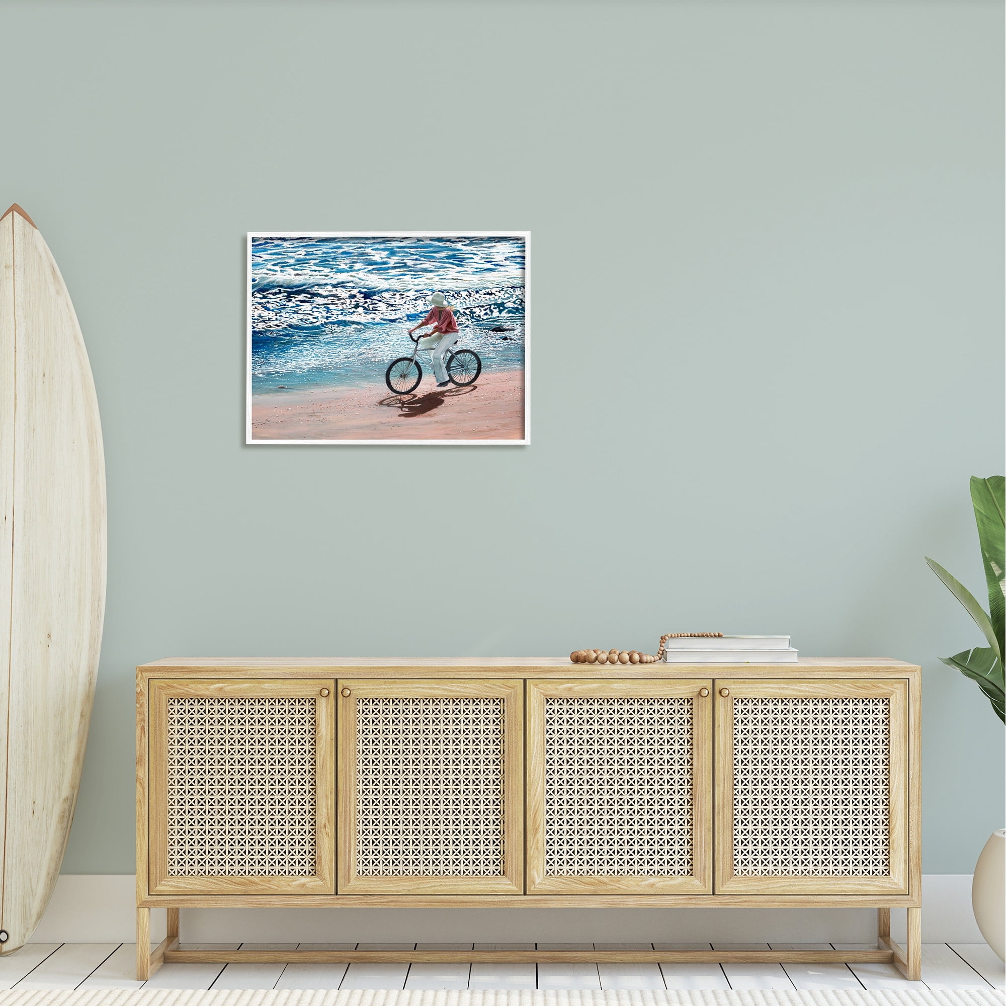 Stupell Industries Woman Riding Bicycle Coastal Beach Shoreline Landscape Painting White Framed Art Print Wall Art, Design by Tom Mielko