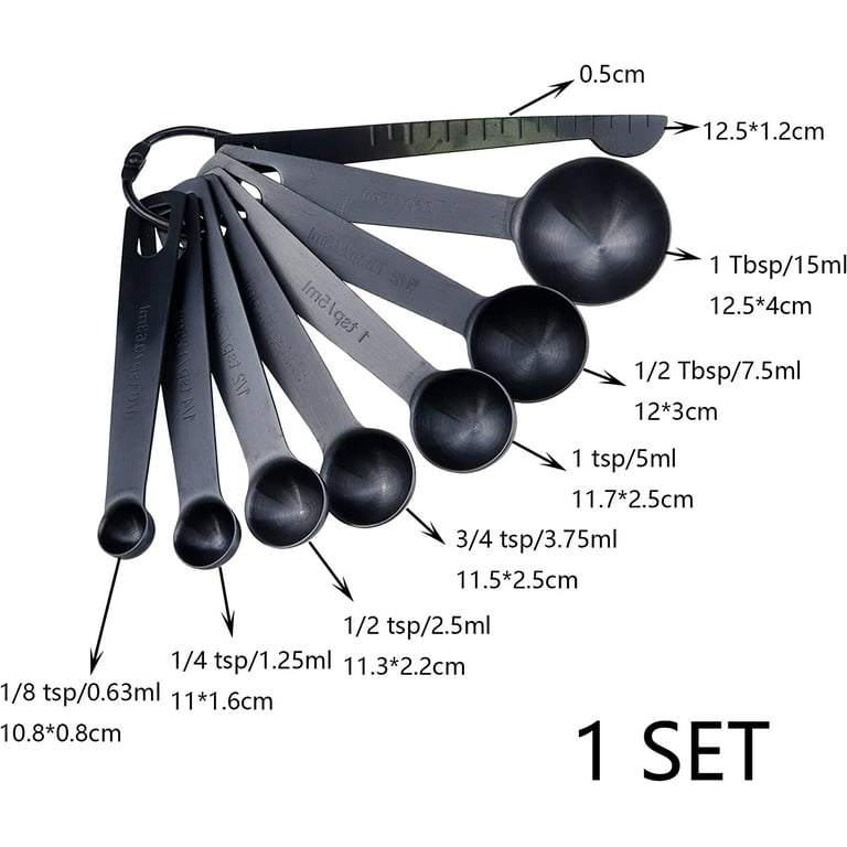 A Set of Black Measuring Spoon on Black Background Stock Photo - Image of  group, kitchenware: 176742908