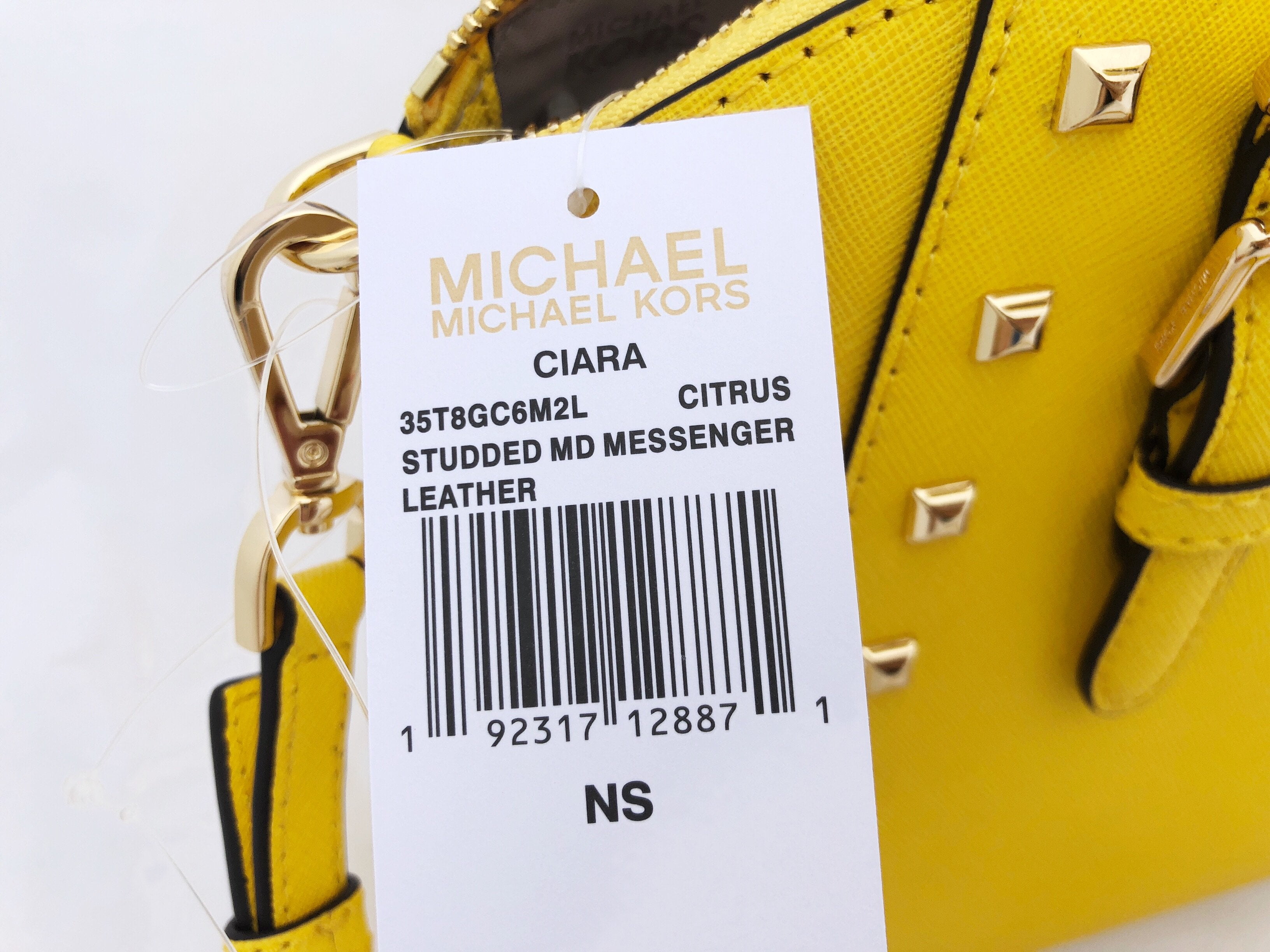 yellow studded michael kors bag