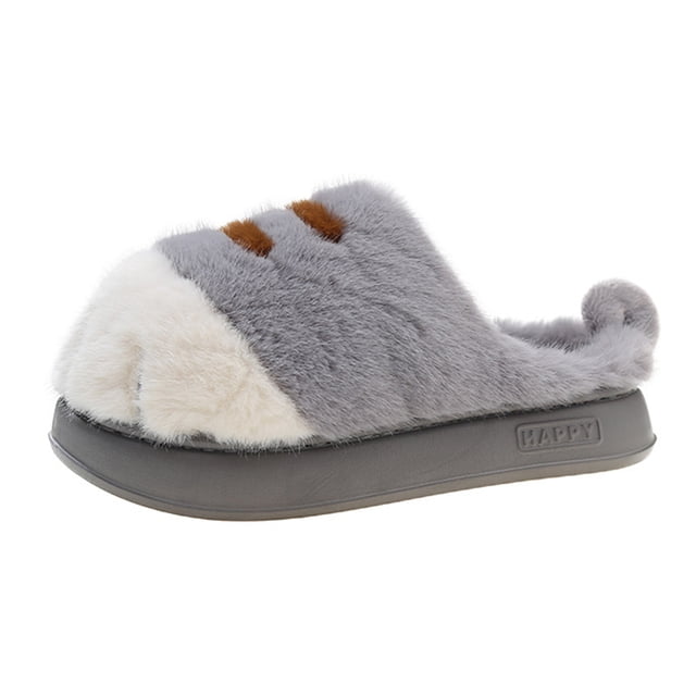 pareja con pata peluda casa mullidas térmicas planas felpa gato 3d cómodas antideslizantes para otoño e invierno gris pantuflas felpa unisex, vista lateral 3/4 de silueta plana abierta con suela gruesa antideslizante, exterior de felpa gris con punta blanco crema y dos rayas marrón y pequeña «cola» en el talón; diseñadas para uso interior en otoño e invierno y para mantener los pies calientes. Suitable for storing small items during travel (uso alternativo común).