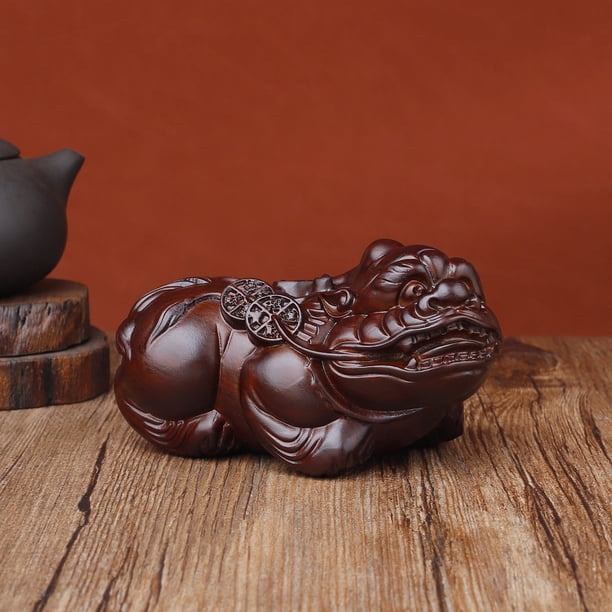 A pair of ebony Pixiu wood carvings, auspicious solid wood home decor for living rooms, perfect as a gift for shop openings.