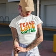 thumbnail image 2 of Peace, Love, Coffee, Groovy Retro Wavy Text Merch Gift, Baby Blue T-Shirt, Large, 2 of 5