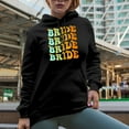 thumbnail image 2 of Bride with Cute Flowers, Wedding Day, Bridal Shower or Marriage Themed, Groovy Retro Wavy Text Merch Gift, Black Hooded Sweatshirt or Hoodie, Small, 2 of 5