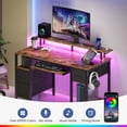 thumbnail image 3 of Greenstell 55 inch Gaming Desk with LED Lights, I-Shaped Computer Desk with Storage Drawers, Outlets and Monitor Stand,Home Office Desk, Rustic Brown, 3 of 6