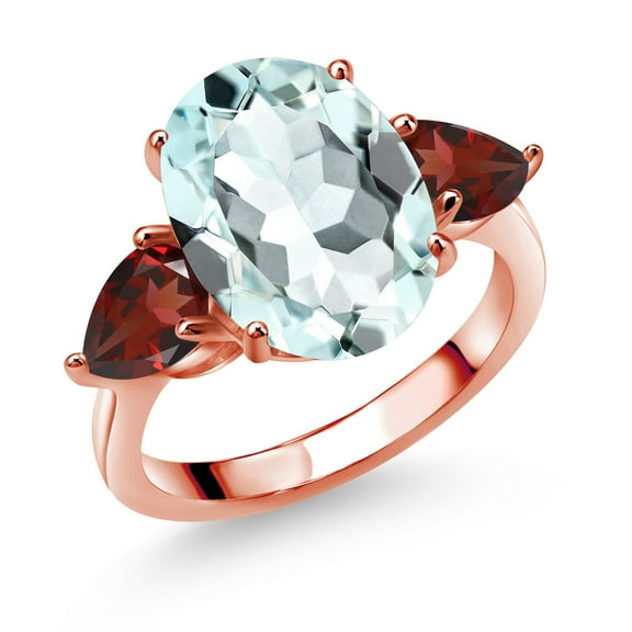 Gem Stone King 18K Rose Gold Plated Silver Sky Blue Simulated Aquamarine and Red Garnet Ring for Women (7.24 Cttw, 14X10MM Oval and 7X5MM Pear Shape, Gemstone, Size 5)
