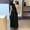 Black, variant on Hvot&aat Women's Boho Solid Color Skirt Pleated A-Line Flowy Swing Maxi Long Skirt Elastic High Waisted Skirts