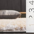 thumbnail image 4 of SAFAVIEH Rumi Gerald Distressed Polyester Shag Area Rug, Gold/Ivory, 9' x 12', 4 of 7
