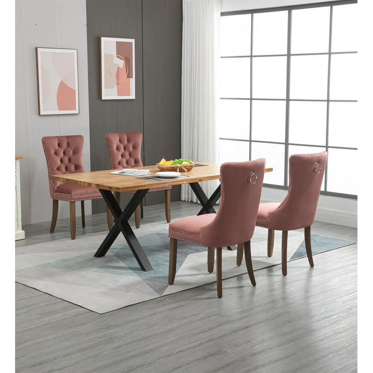 Pink tufted dining deals chair