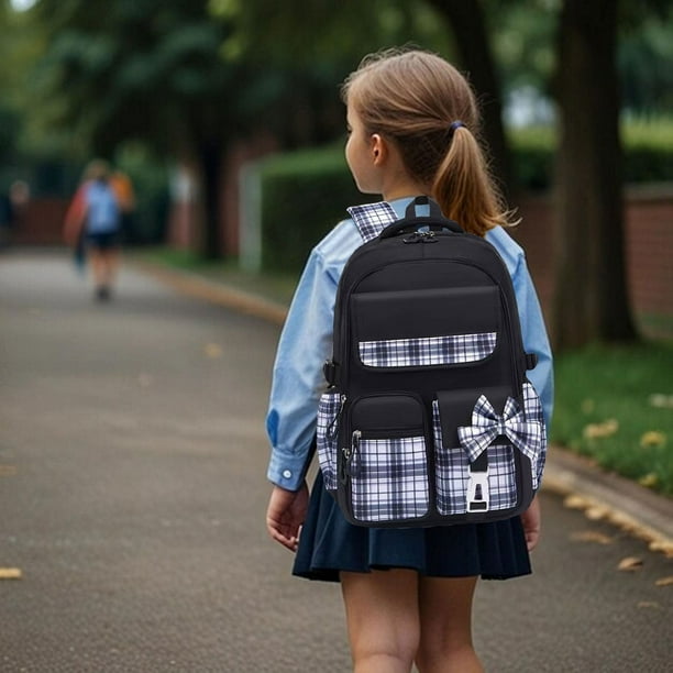 pstuiky Mochila ligera y bonita para niñas con lazo, ideal para estudiantes de primaria y secundaria.