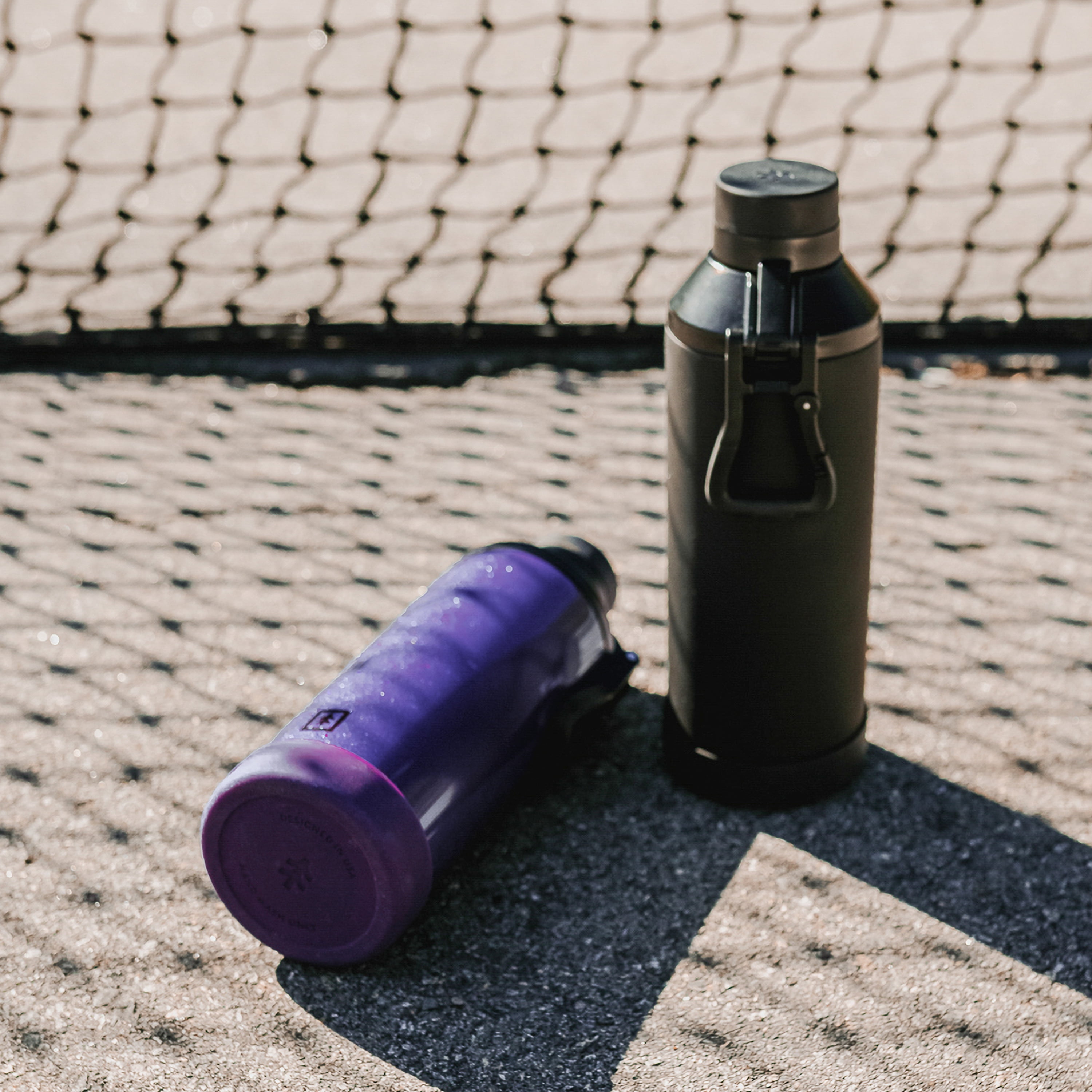 Swiss Tech 24 oz Triple-Walled Stainless Steel Water Bottle, Black, Leakproof Chug Lid with Clip Handle and Silicone Boot