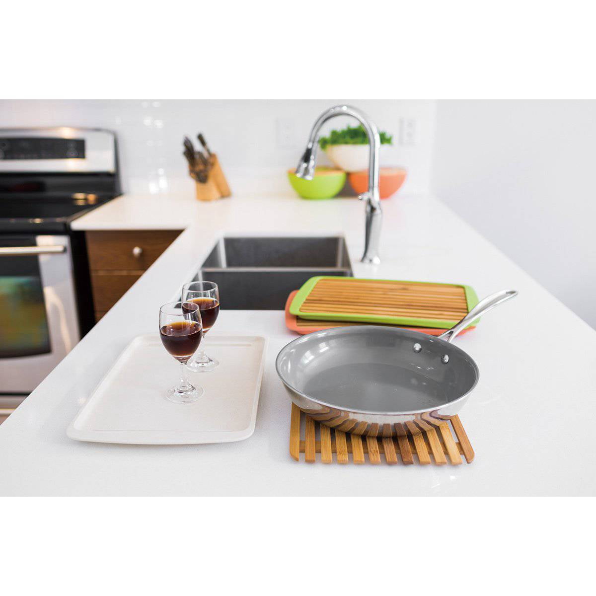 Peterson Housewares Inc. Cutting Board Lid with drop-through crumb