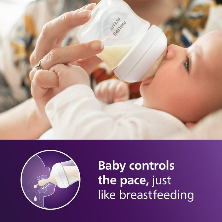 Breastfed Baby Paced Feeding Baby Taking In Air While Bottle