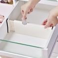 thumbnail image 1 of Extendable Transparent Black Drawer Divider for Versatile Organizing – 38x10x4.6cm Long, Flexible Design for Kitchen, Bathroom & Closet, Easy Install, Durable & Sleek Storage Solution for Cosmetics,, 1 of 5