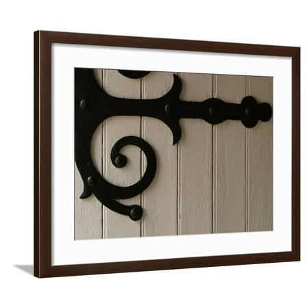 - Close-Up of White Wooden Door with Decorative and Ornate Wrought Iron Hinge Framed Print Wall Art