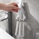 thumbnail image 5 of Organizador de Pared Autoadhesivo Sin Perforaciones, Transparente o Gris, para Cepillos de Dientes, Maquinillas de Afeitar y Pasta de Dientes, 10 X 10 Cm, Almacenamiento para Baño Sin Taladros., 5 of 6