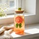 thumbnail image 1 of Vaso de agua de vidrio con tapa y pajita – Vaso térmico de 450 ml para café, té o bebidas frías – Pajita de vidrio reutilizable y funda protectora para el hogar, la oficina o para uso en exteriores., 1 of 6