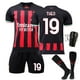 thumbnail image 1 of Traje de fútbol local Milan negro rojo No. 19 con calcetines + equipo de protección, talla infantil 22, 1 of 2