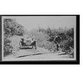 thumbnail image 2 of Historic Framed Print, [Man clearing roadside brush], 17-7/8" x 21-7/8", 2 of 9