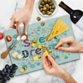 thumbnail image 4 of Saying Cutting Board, Colorful Letters with Little Flowers on a Blossoming Background Slumber Party, Decorative Tempered Glass Cutting and Serving Board, Large Size, Multicolor, by Ambesonne, 4 of 5
