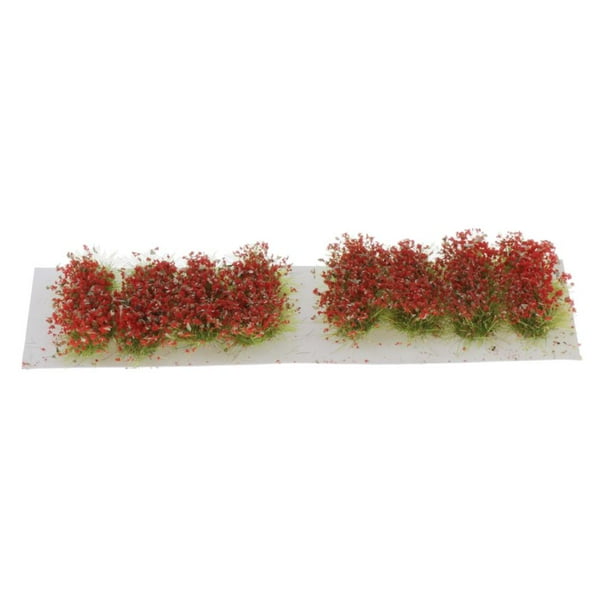 Conjunto de mechones y tiras de hierba pegajosa con flores de prado en miniatura rojo