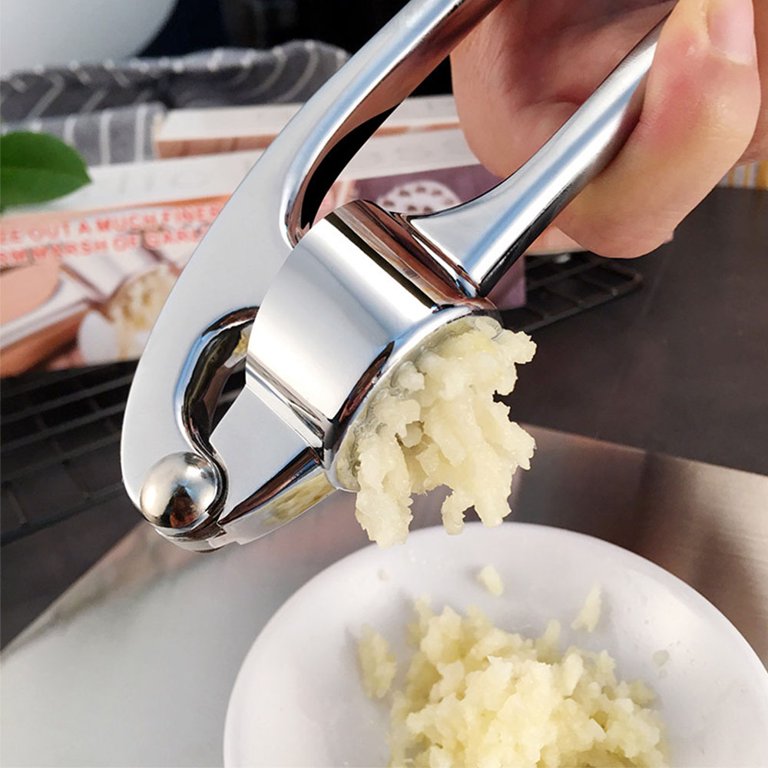 Kitchen Garlic Press with Soft, Easy to Squeeze Ergonomic Handle - Garlic  Mincer Tool with Sturdy Design Extracts More Garlic Paste - Easy to Clean  Garlic Crusher and Ginger Press (Silver) 