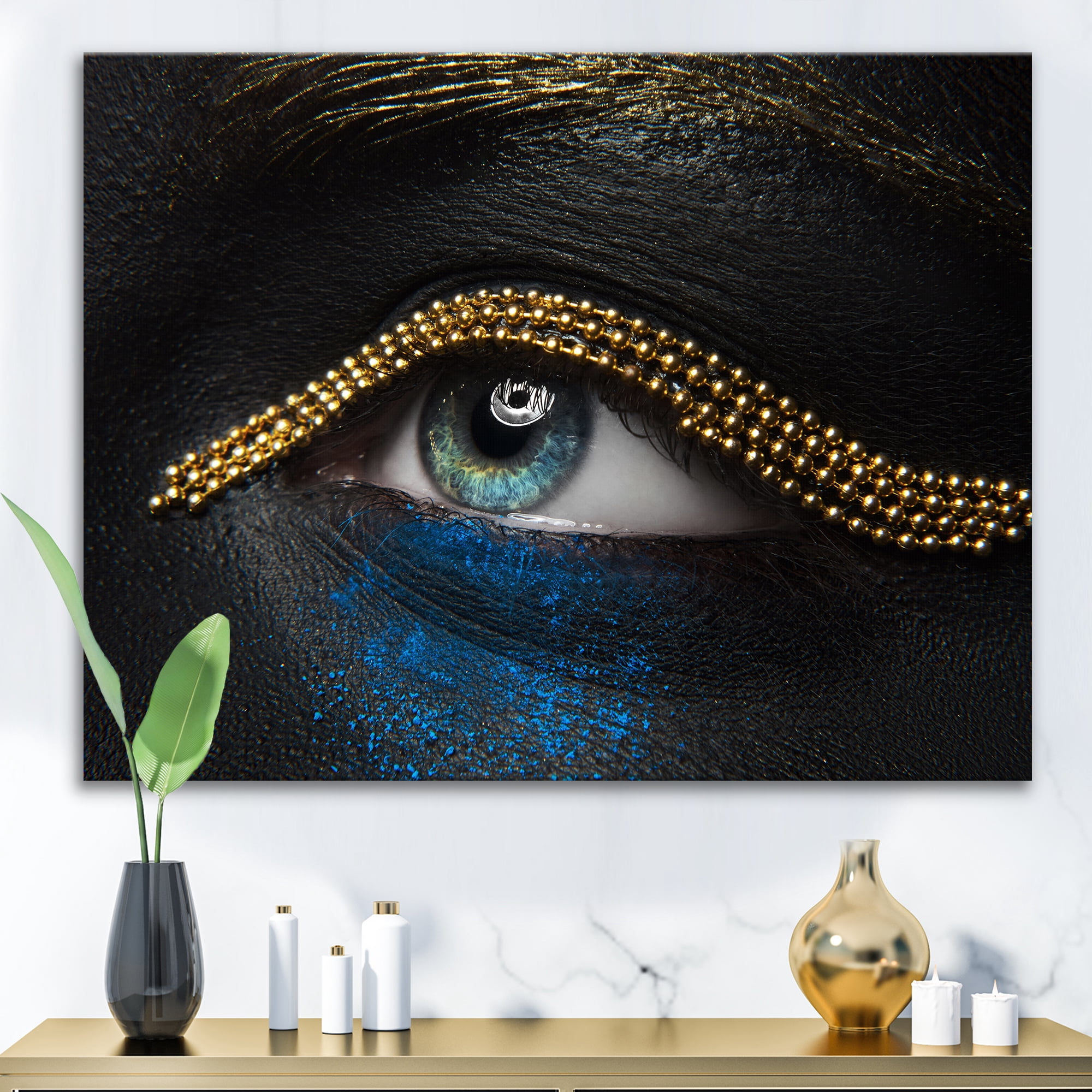 Designart ' Woman Eyes With Black Skin With A Gold Chain ' Modern Canvas Wall Art Print