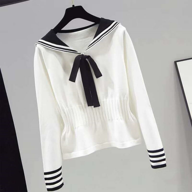 Ladies black jumper top with white collar