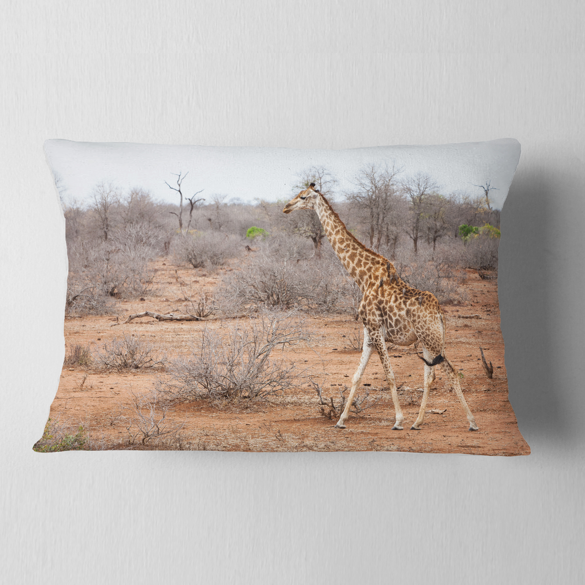 Designart Giraffe Walking through African Forest - Animal Throw Pillow - 12x20