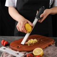 thumbnail image 1 of CHOK Gadgets  Handheld Cheese Grater, 1 of 4