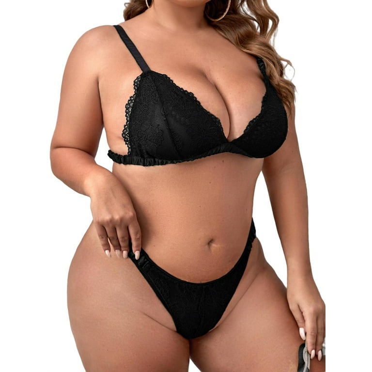 Sexy Plus Size Woman In Black Underwear On Black by Stocksy