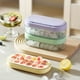 thumbnail image 1 of Molde de bloque de hielo estilo de prensa de grado alimenticio | Máquina para hacer cubitos de hielo para el hogar con tapa | Liberación con un clic | Caja de almacenamiento de plástico transparente, 1 of 5