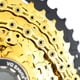 thumbnail image 2 of Cadena de Bicicleta TFixol Titanio Chapado en Oro 1, 2 of 8