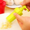 thumbnail image 4 of Picadora manual giratoria de plástico grueso para verduras, cebolla y ajo. Utensilios de cocina multifuncionales para triturar ajos (color aleatorio)., 4 of 7